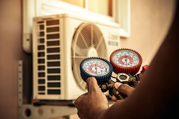 Professional Hvac technician working in Adamsville, TN